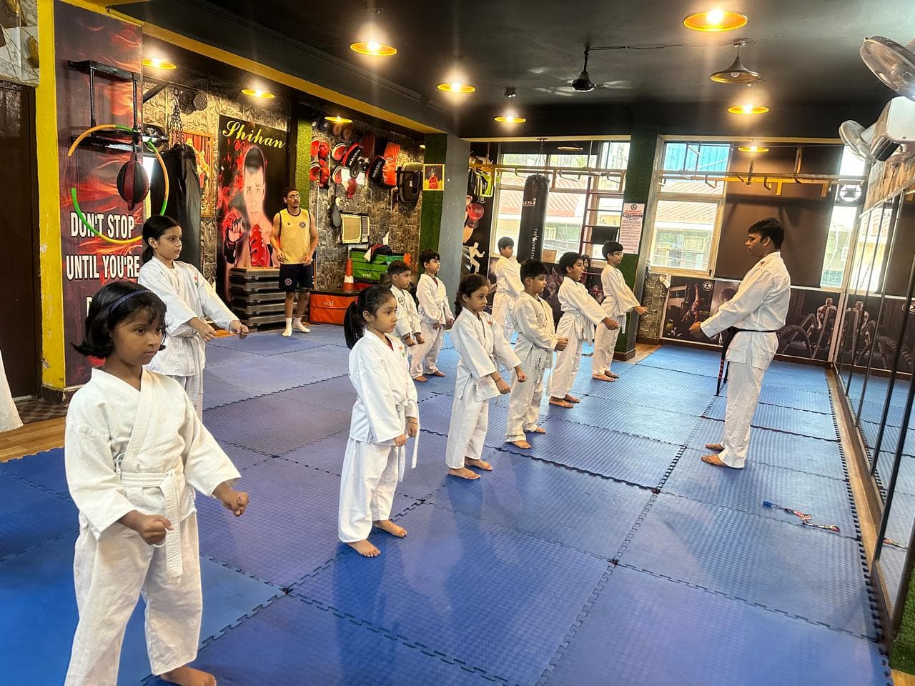 Students performing martial arts drills together