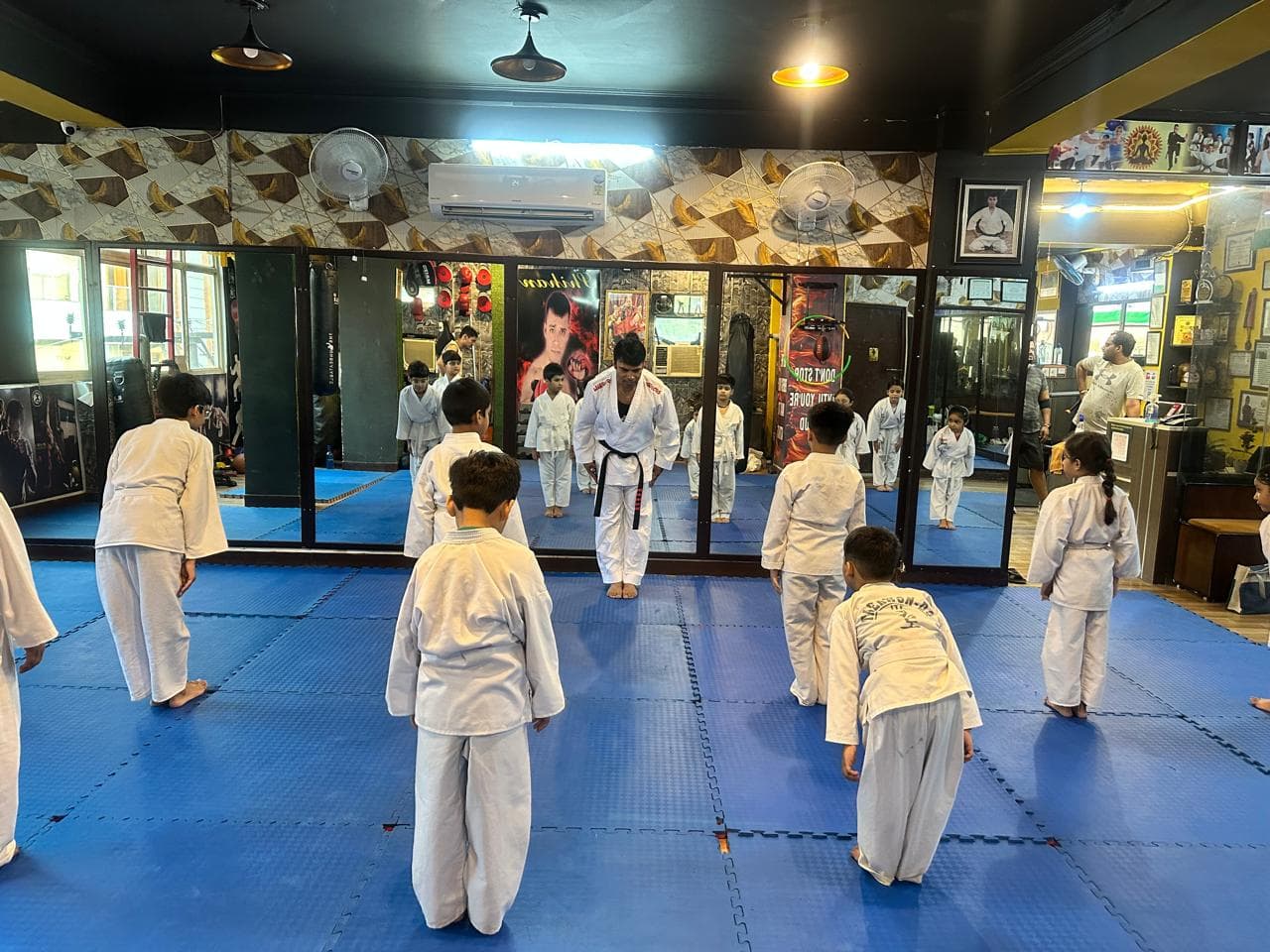 Children standing in formation during martial arts practice